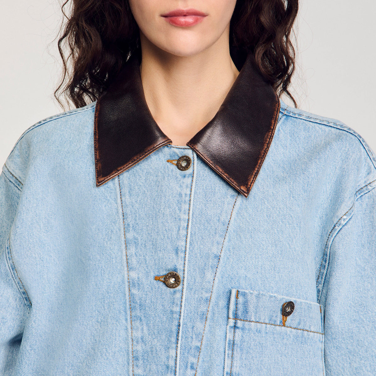 Sandro Denim jacket with leather collar