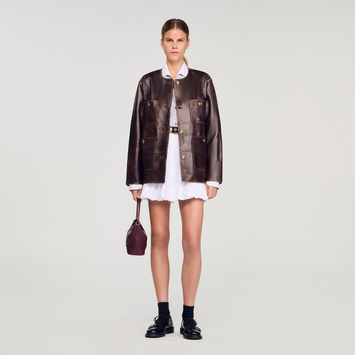 Sandro Long distressed leather jacket