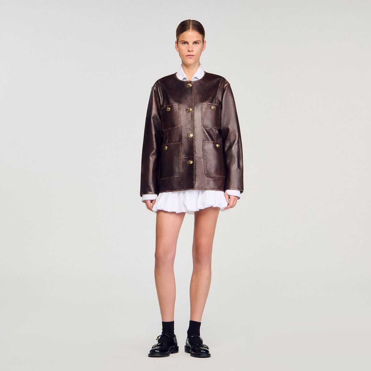 Sandro Long distressed leather jacket
