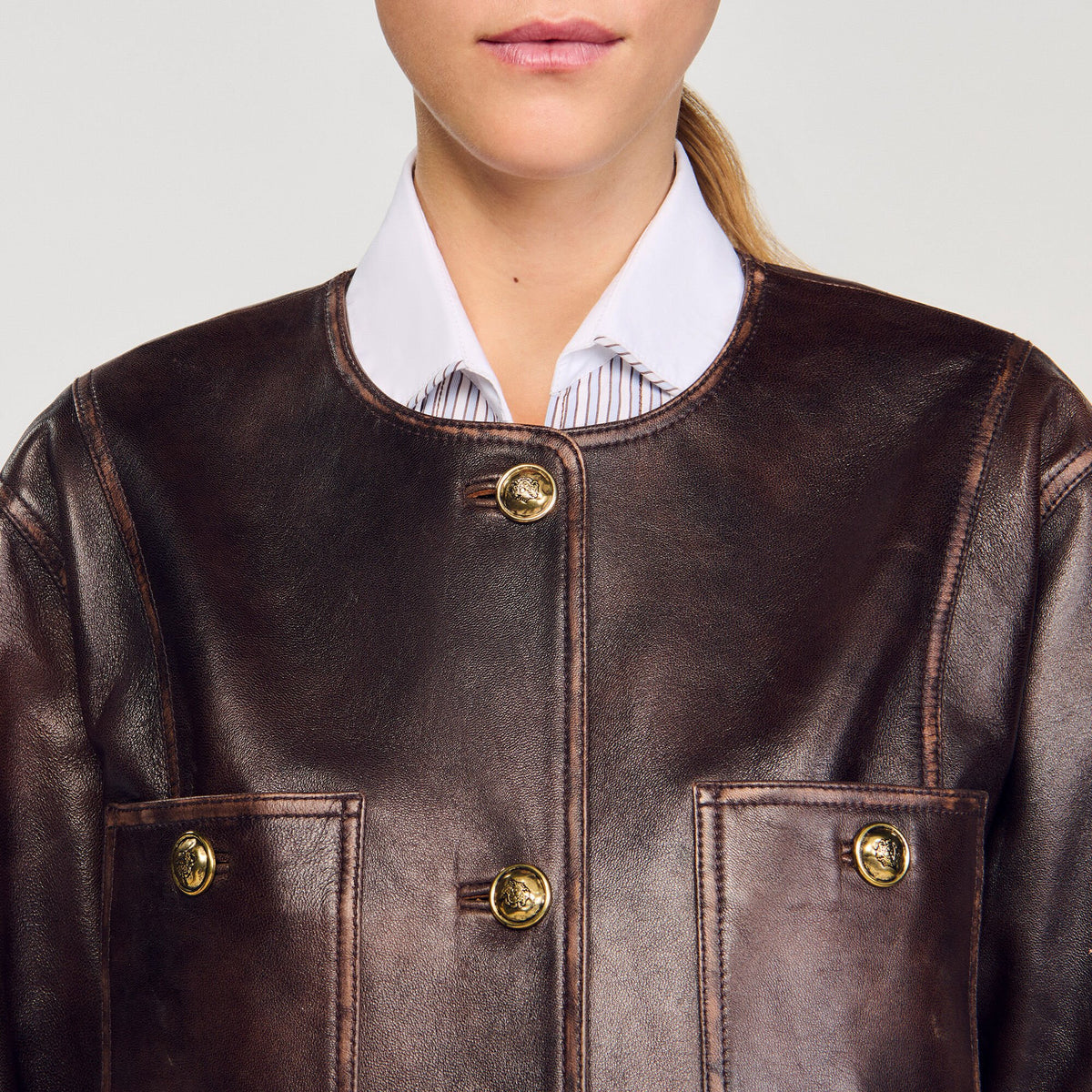 Sandro Long distressed leather jacket