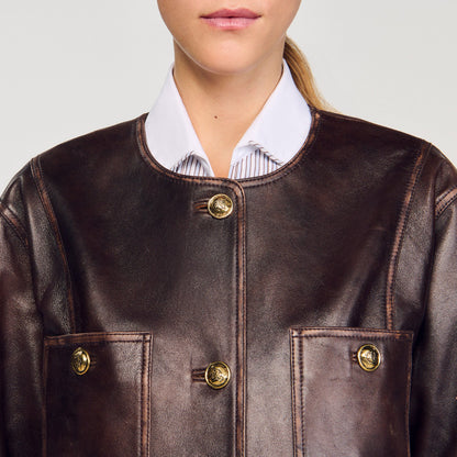 Sandro Long distressed leather jacket