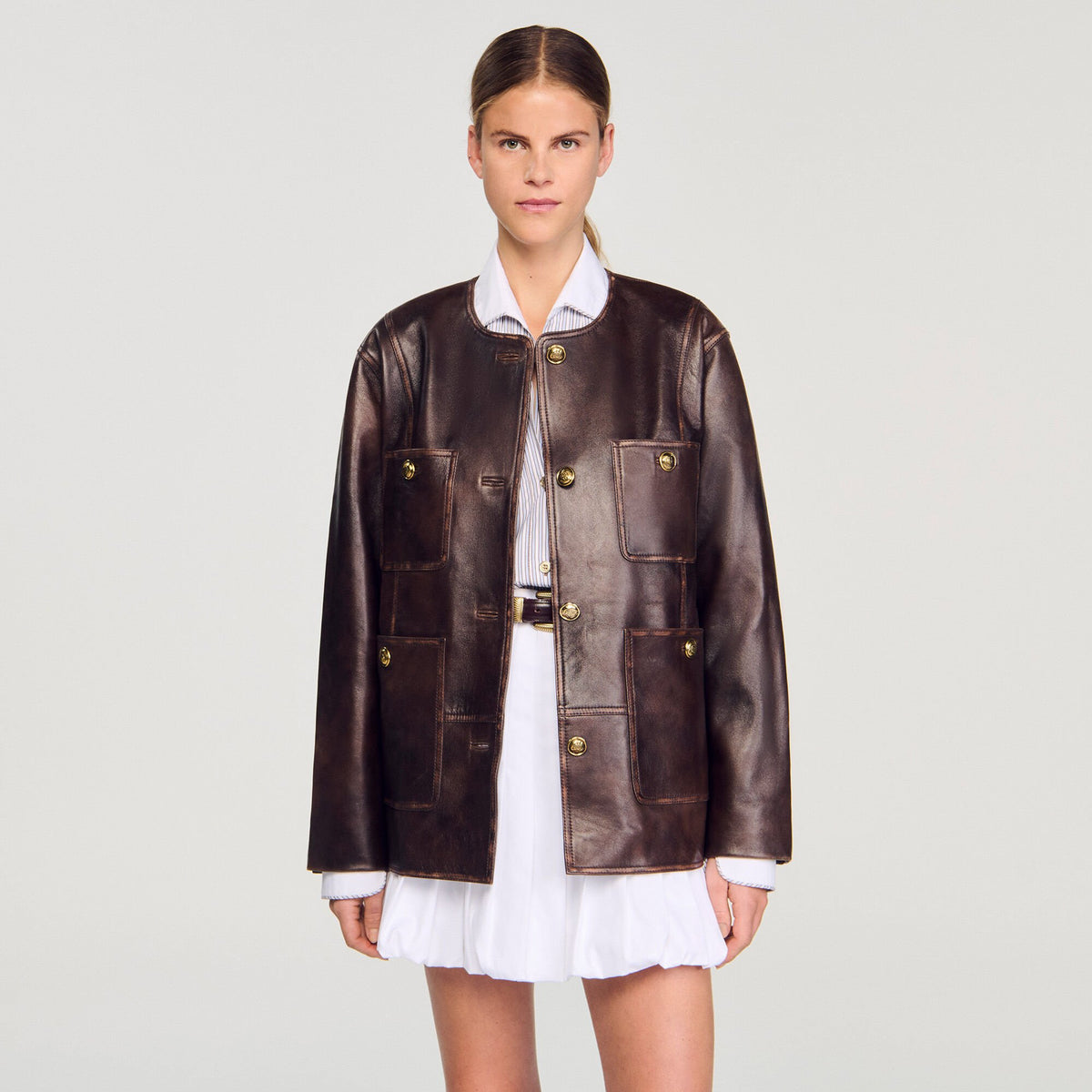 Sandro Long distressed leather jacket