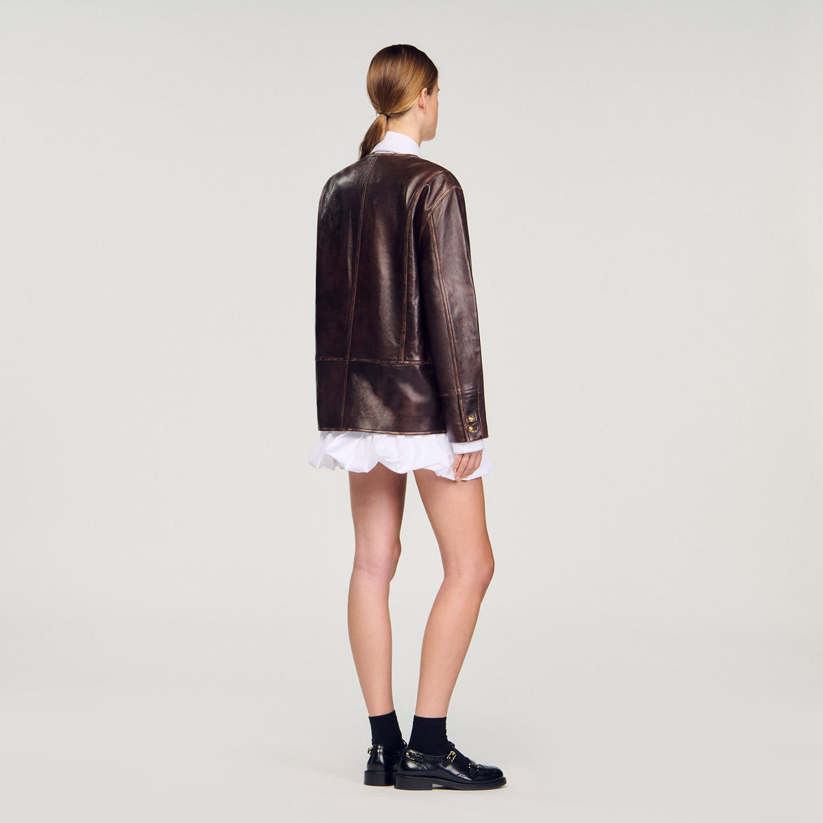 Sandro Long distressed leather jacket