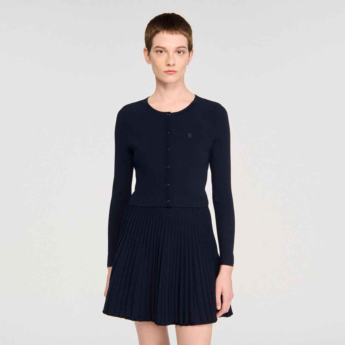 Sandro Polo shirt with decorative buttons