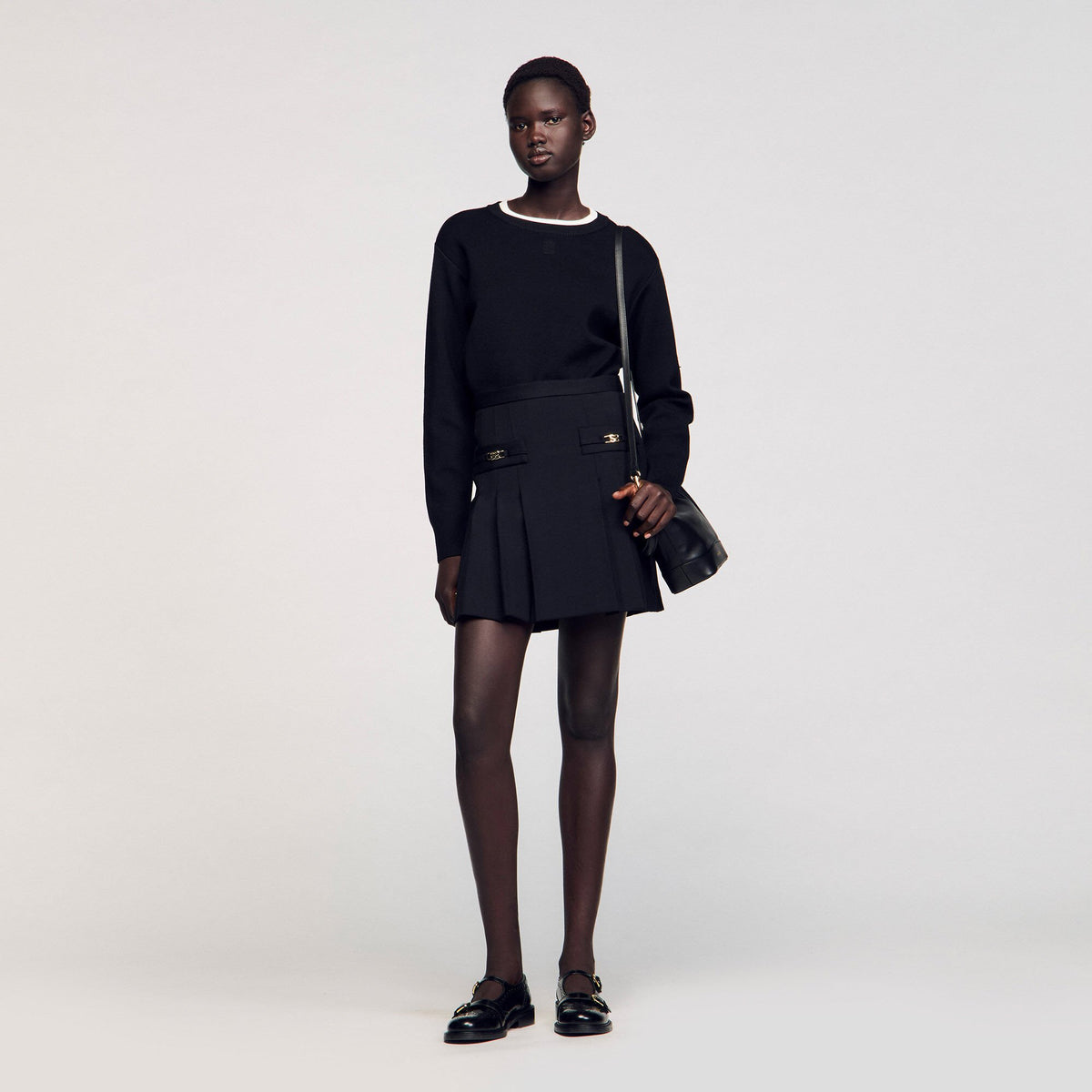 Sandro Mini skirt with stitched pleats