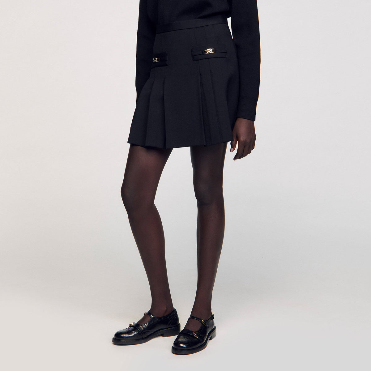 Sandro Mini skirt with stitched pleats