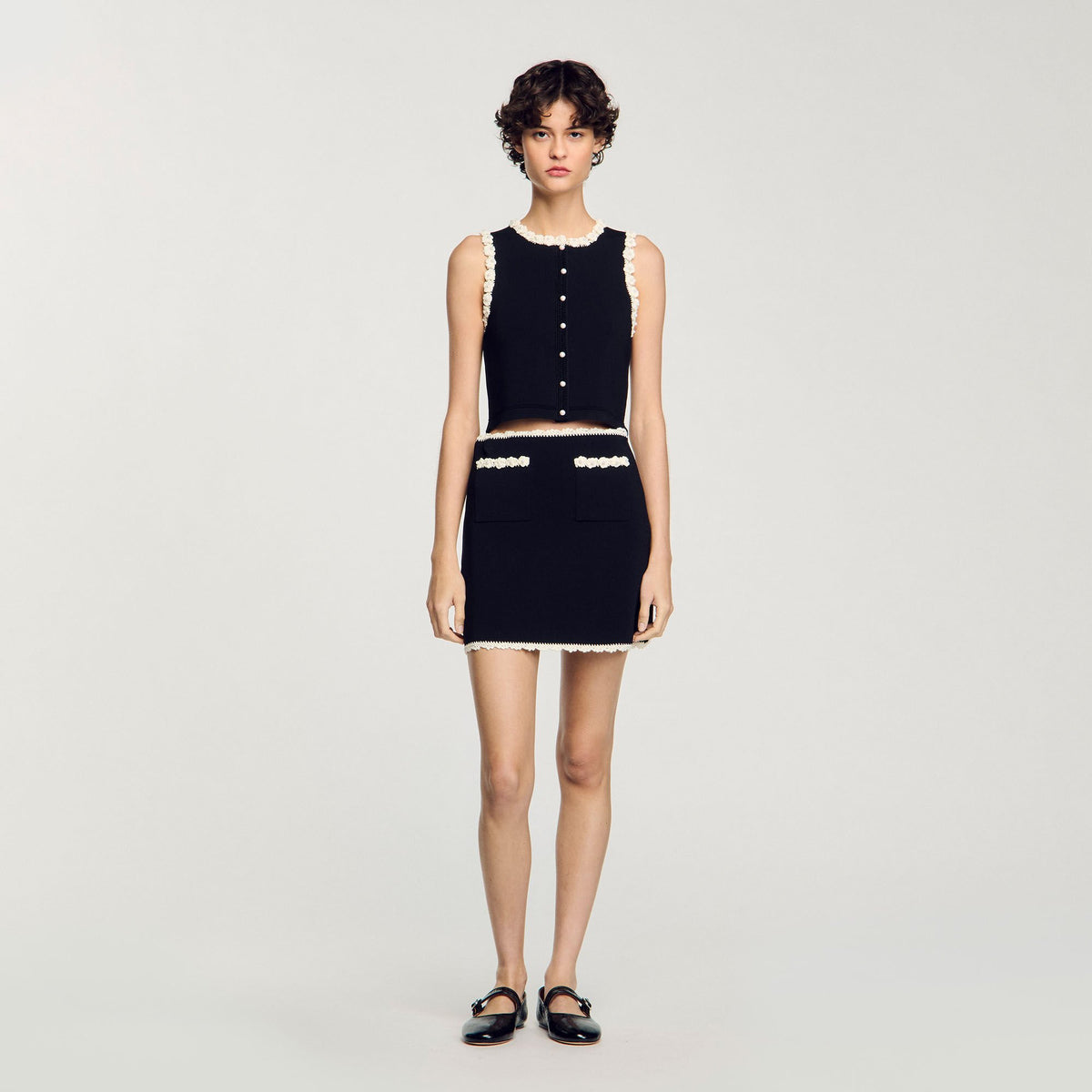 Sandro Mini skirt with crochet details