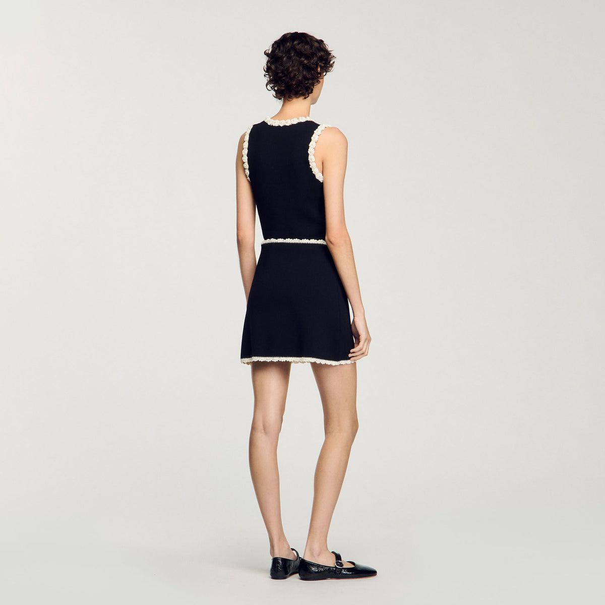 Sandro Mini skirt with crochet details