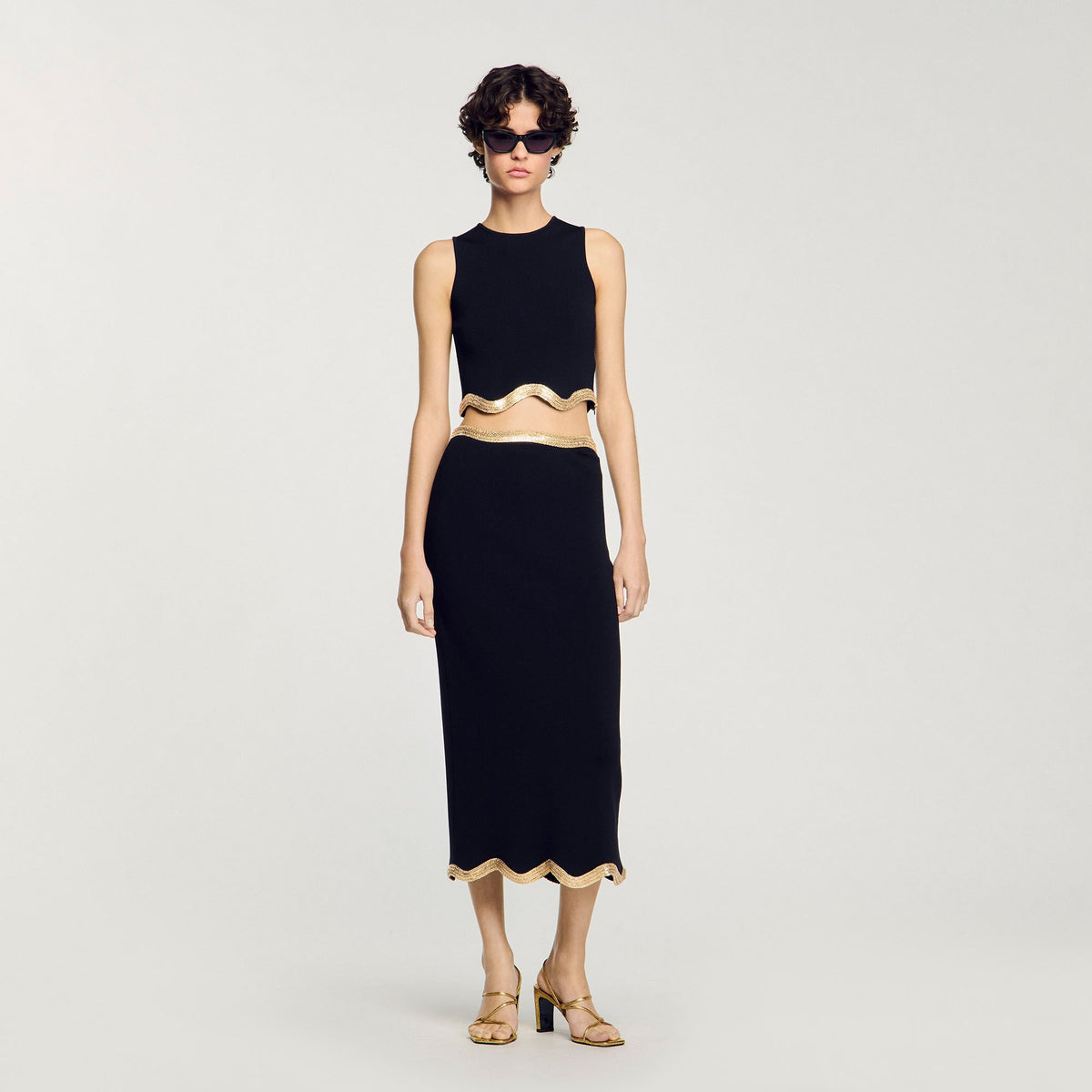 Sandro Maxi knitted skirt with chain detail