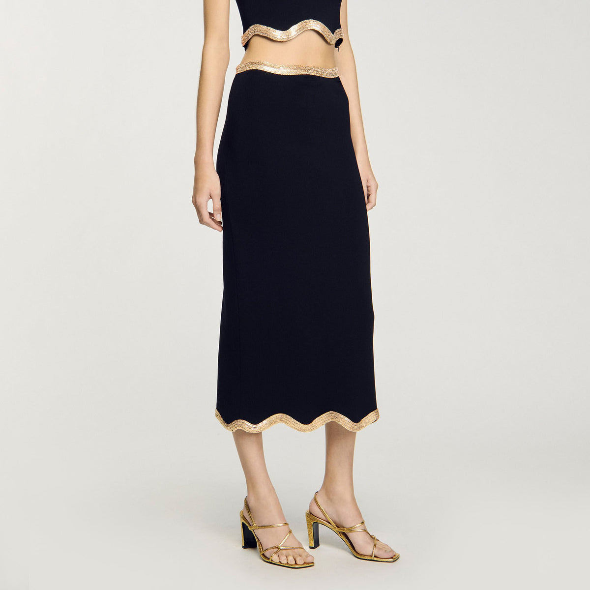 Sandro Maxi knitted skirt with chain detail