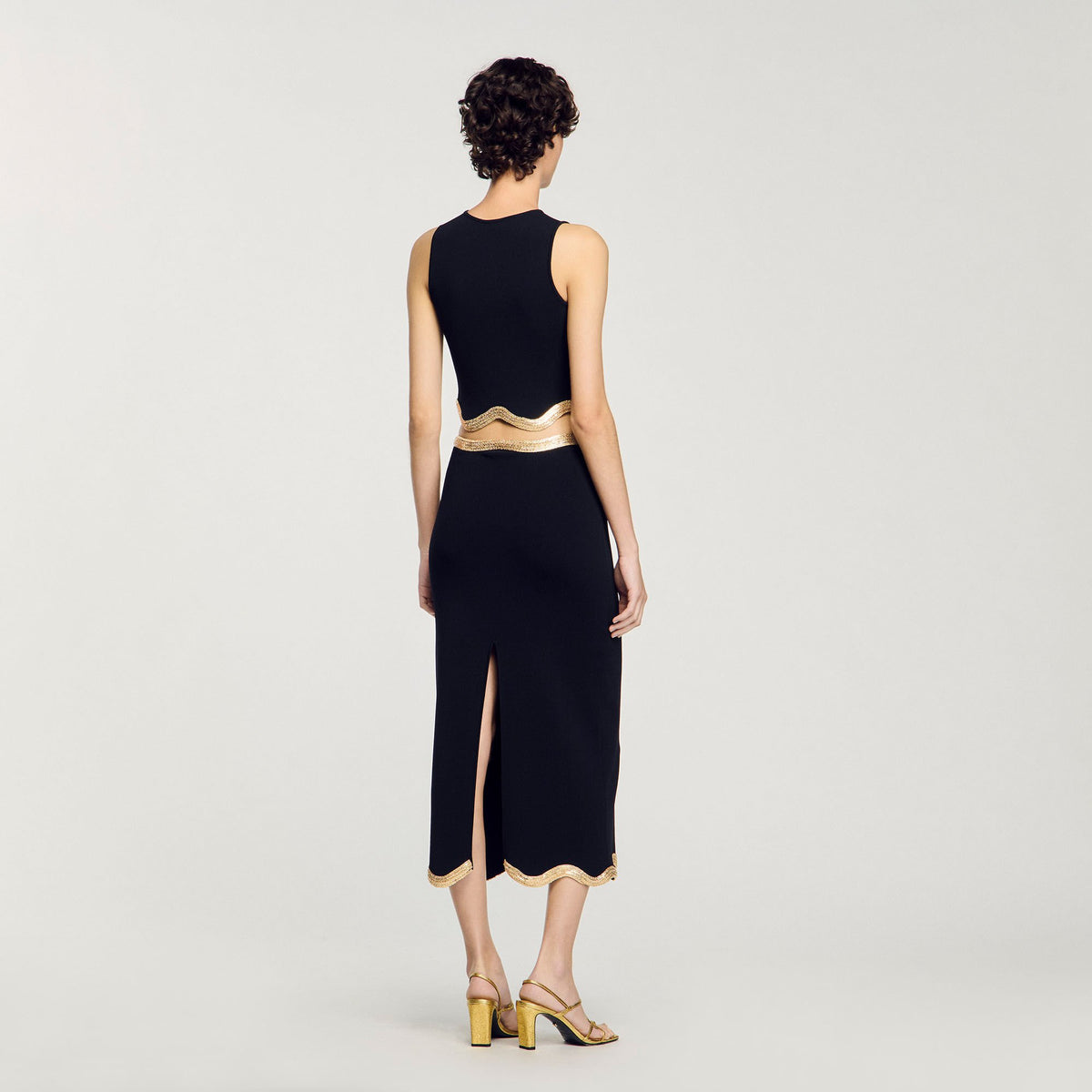 Sandro Maxi knitted skirt with chain detail