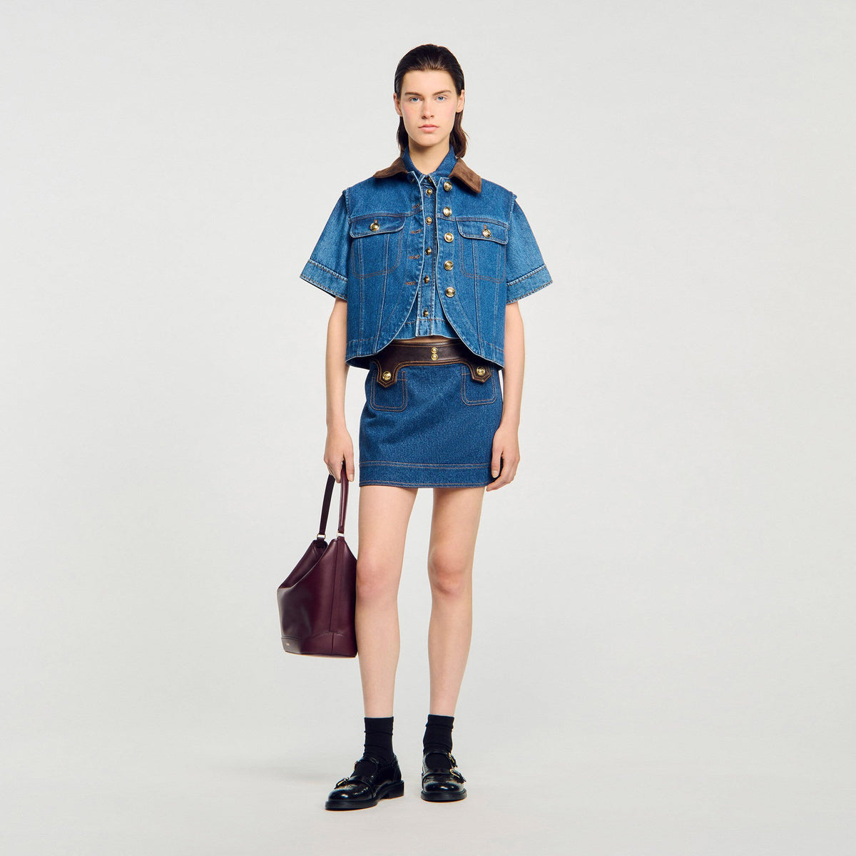 Sandro Mini denim and leather skirt
