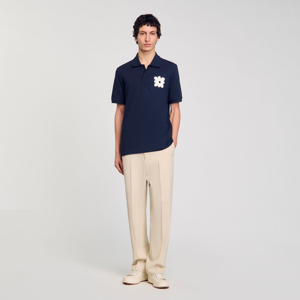 Sandro Polo shirt with flower patch