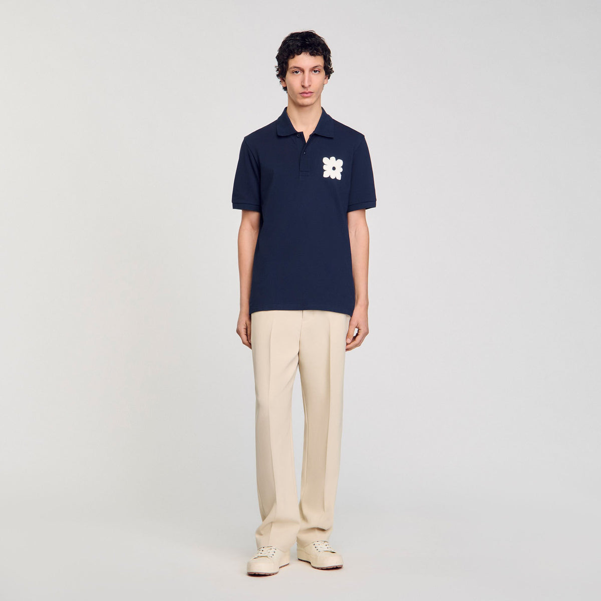 Sandro Polo shirt with flower patch