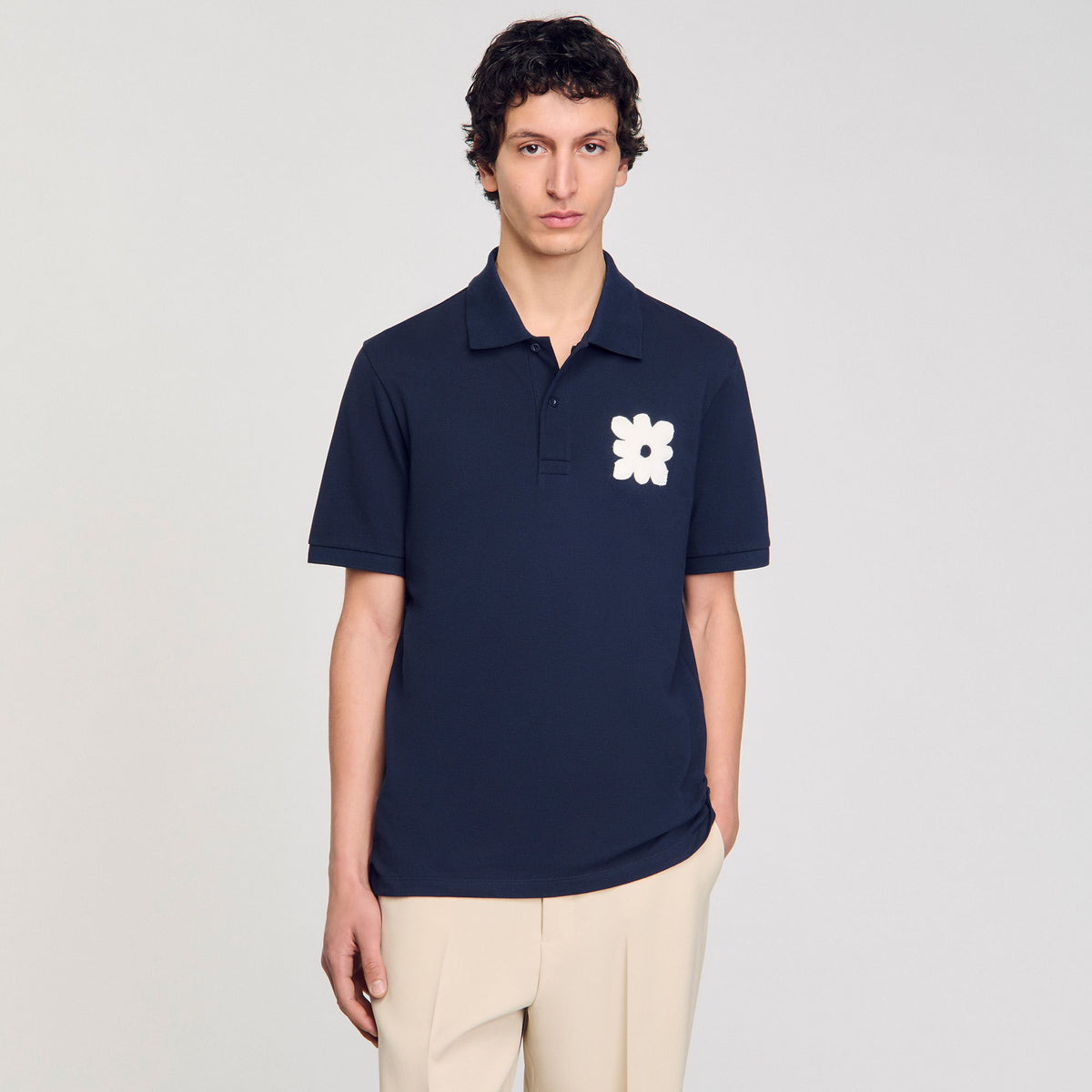 Sandro Polo shirt with flower patch