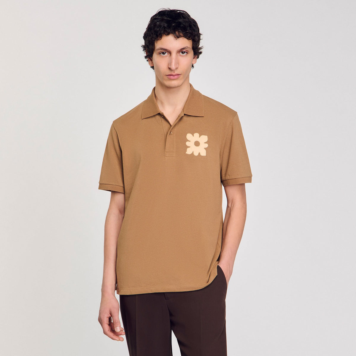 Sandro Polo shirt with flower patch