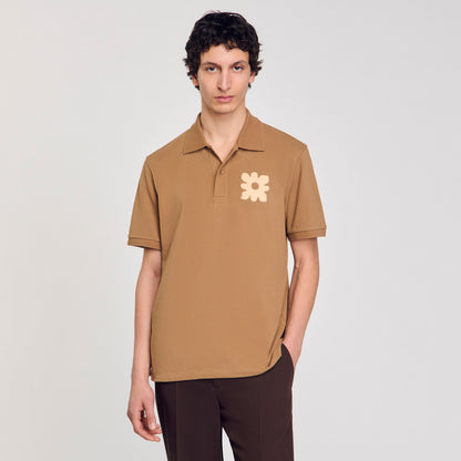 Sandro Polo shirt with flower patch