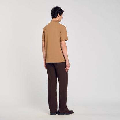 Sandro Polo shirt with flower patch