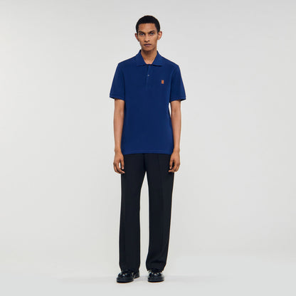 Sandro Polo shirt with leather logo