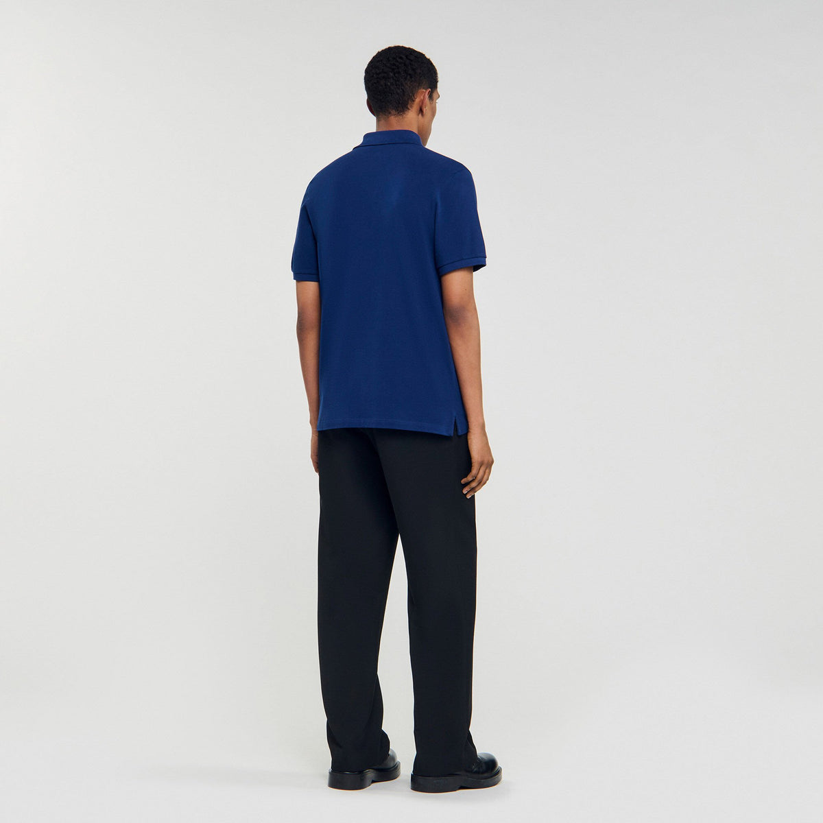Sandro Polo shirt with leather logo